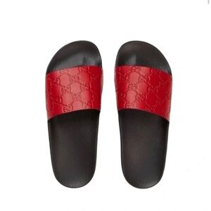 Gucci Embossed Guccissima Leather Pool Slides Women’s Size 38 (size 8).
